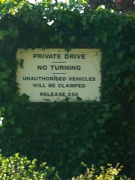 Clamped sign Surrey UK April 2014