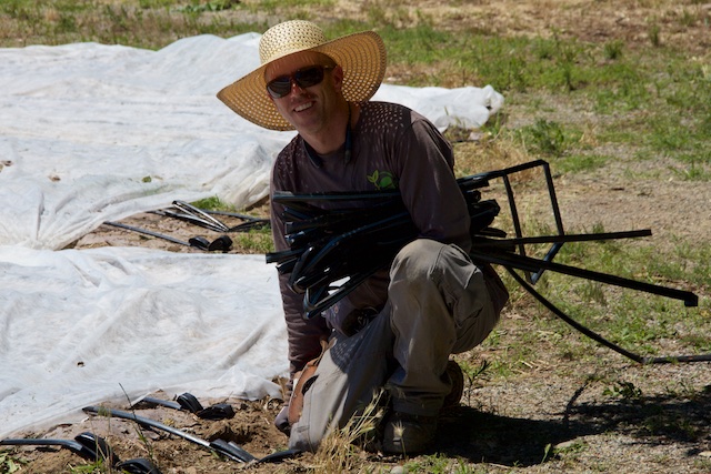 McGlone Workday June 27, Nick Gruber of Produce Denver adjusts irrigation lines 2, IMG_1259